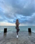 Olga Yoga Eagle pose ⠀ ⠀ ⠀ yogaoutdoors