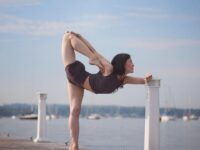 Elena Day 8 of SummerAlo2 YogaChallenge is a balance on