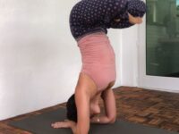 Karina Sanchez @karinasana yoga Squeezing some inversions at lunch break from my