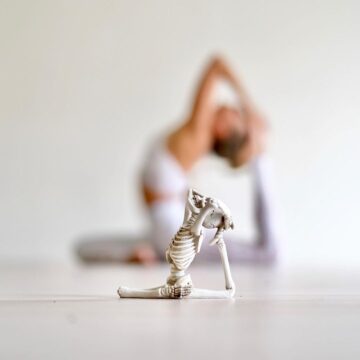 Robin Martin @robinmartinyoga Upstaged by a skeleton Seems to happen every