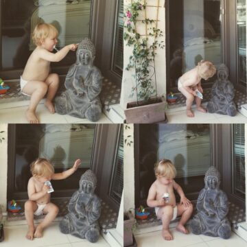 Sara Yogateacher @fityogi mom my little boy connecting with his buddha