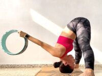 Sha @shanarquia Practicing a wide legged forward fold using my YogaWheel